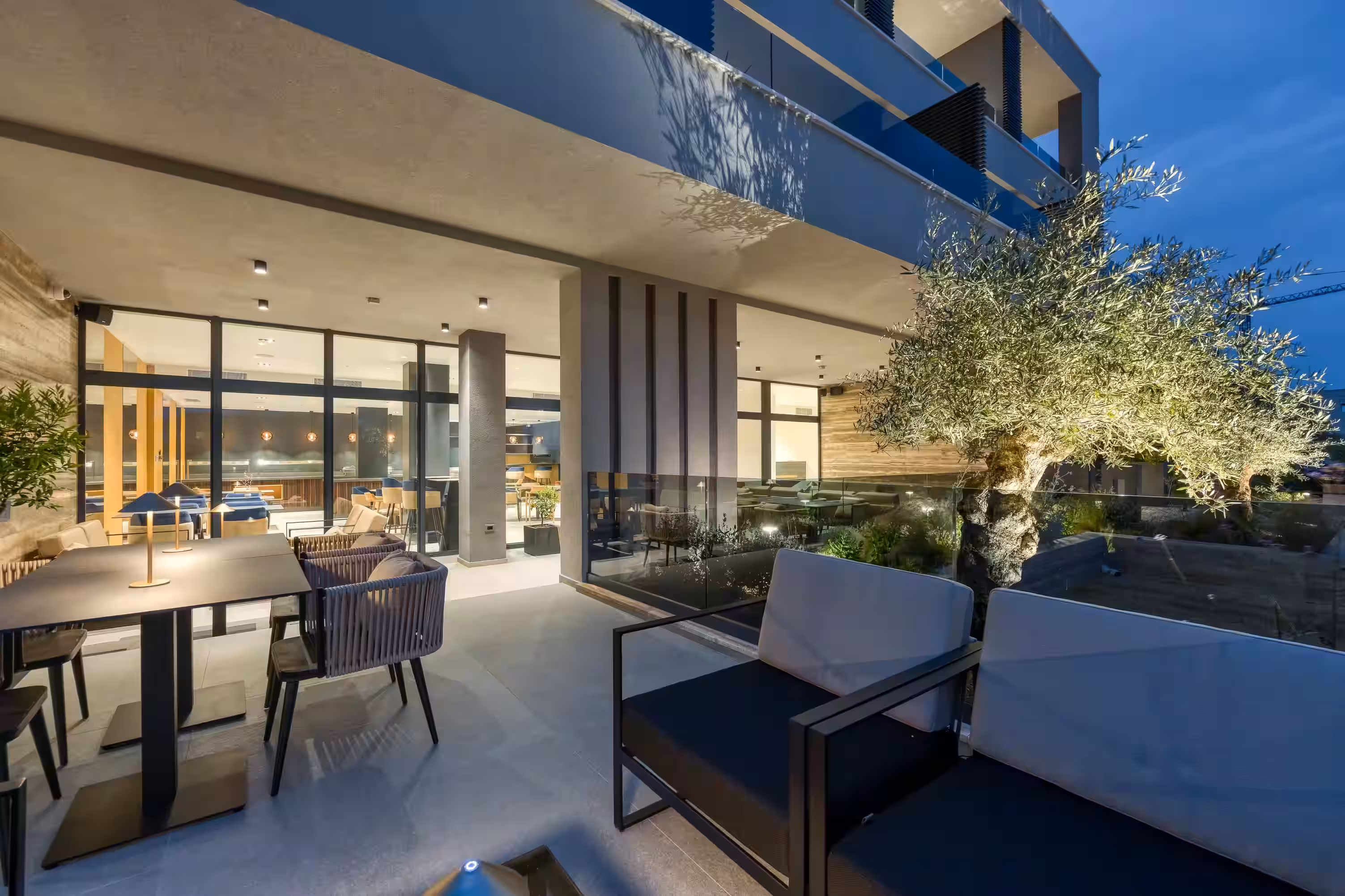 Level 5 Rovinj outdoor terrace with lounge seating at dusk