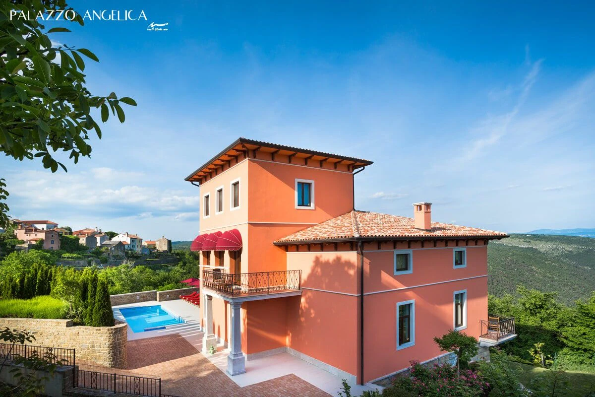Palazzo Angelica red villa with pool set in green countryside