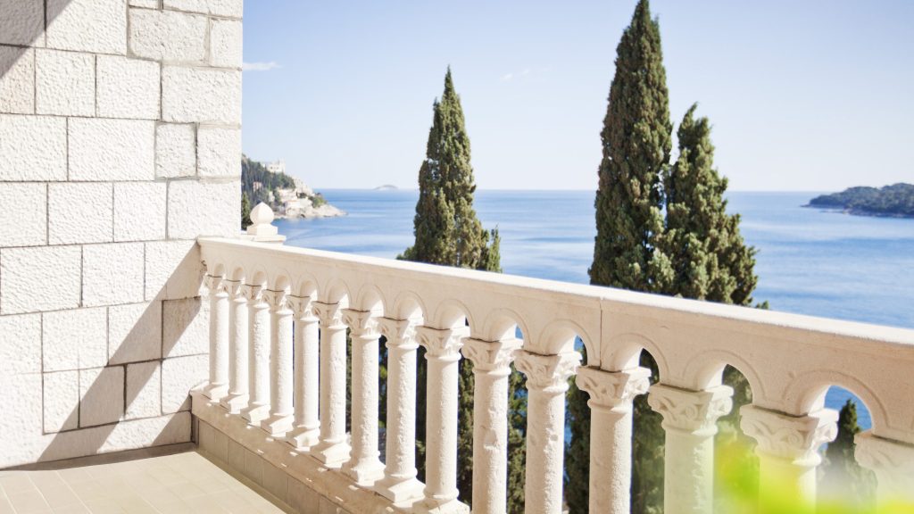 Hotel Villa Argentina, Dubrovnik stone balustrade with cypress trees and sea view