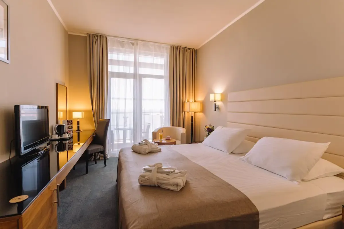Hotel Lero, Dubrovnik double bedroom with folded towels on the bed and desk