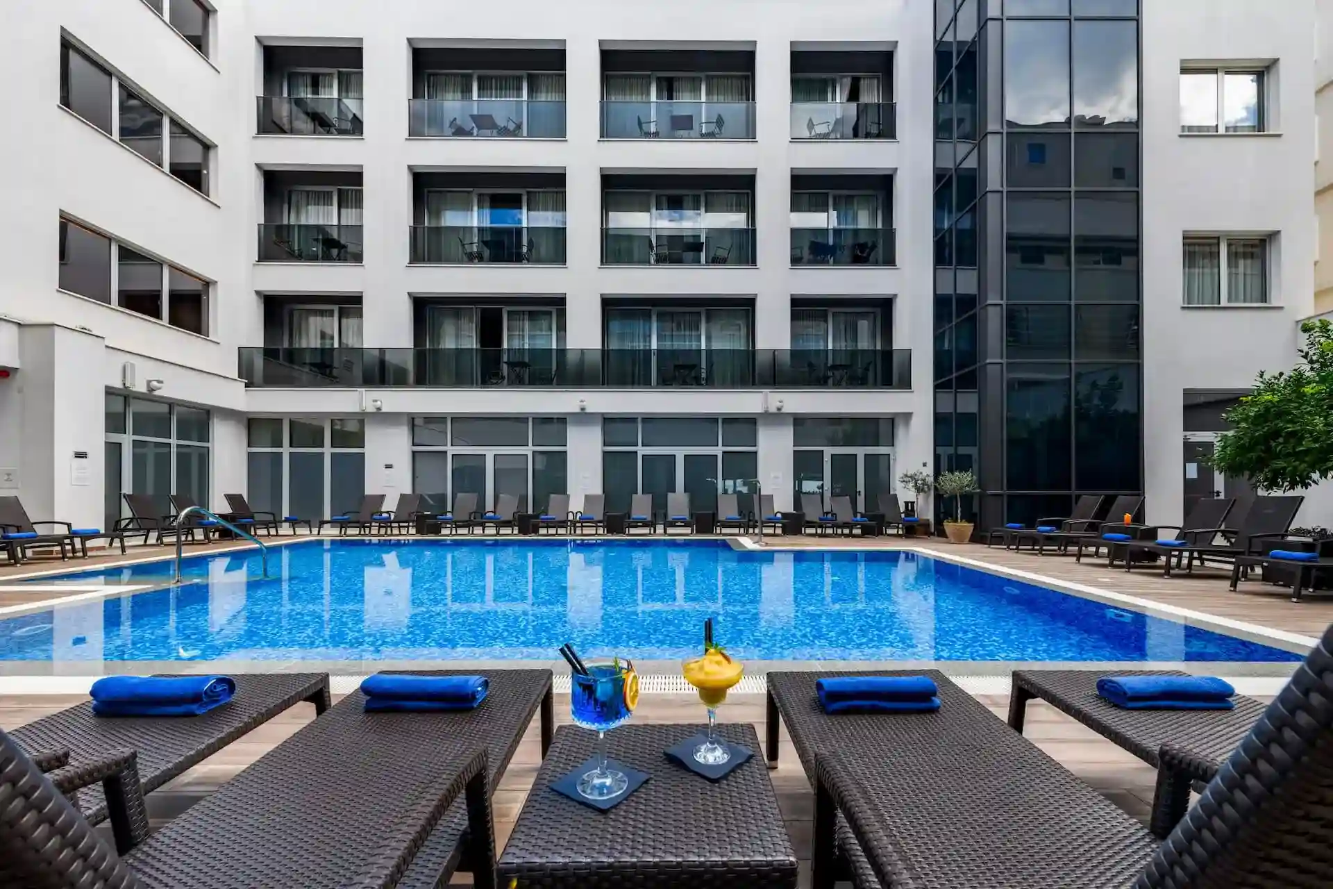 Hotel Lero, Dubrovnik outdoor pool with loungers beside the hotel building