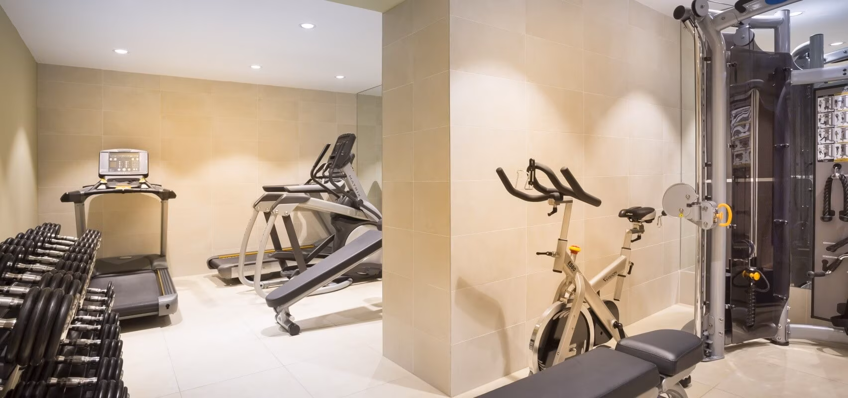 Hotel Kvarner gym with cross-trainer and exercise bike