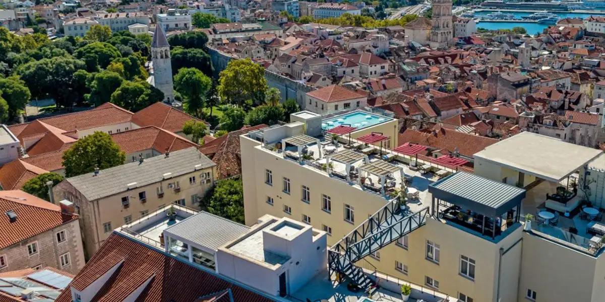 Hotel Cornaro aerial view of the hotel rooftop amid the old town