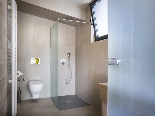 Gospoja shower room with glass screen and toilet