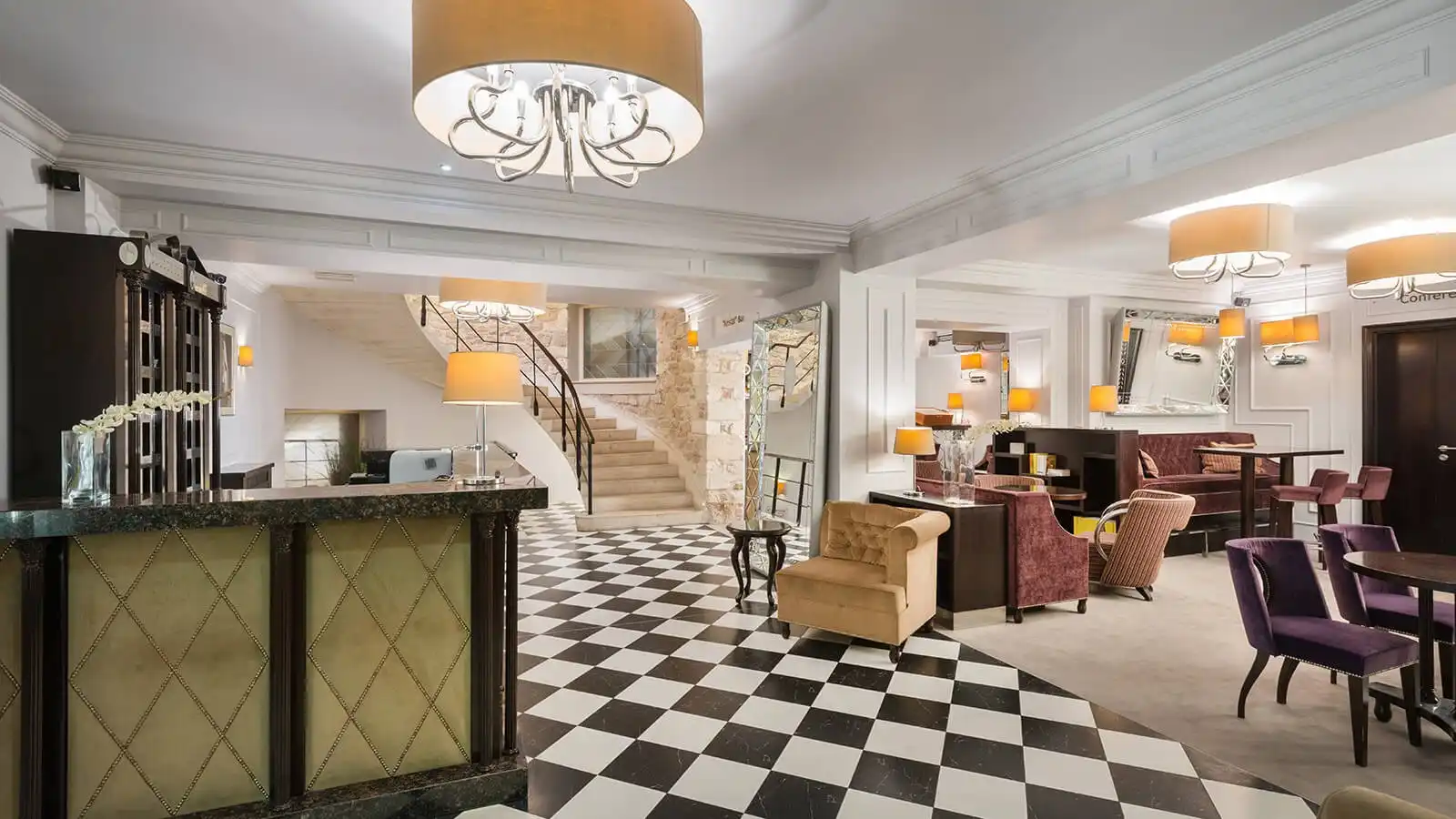 Boutique Hotel Bastion lobby with chequered floor and reception desk