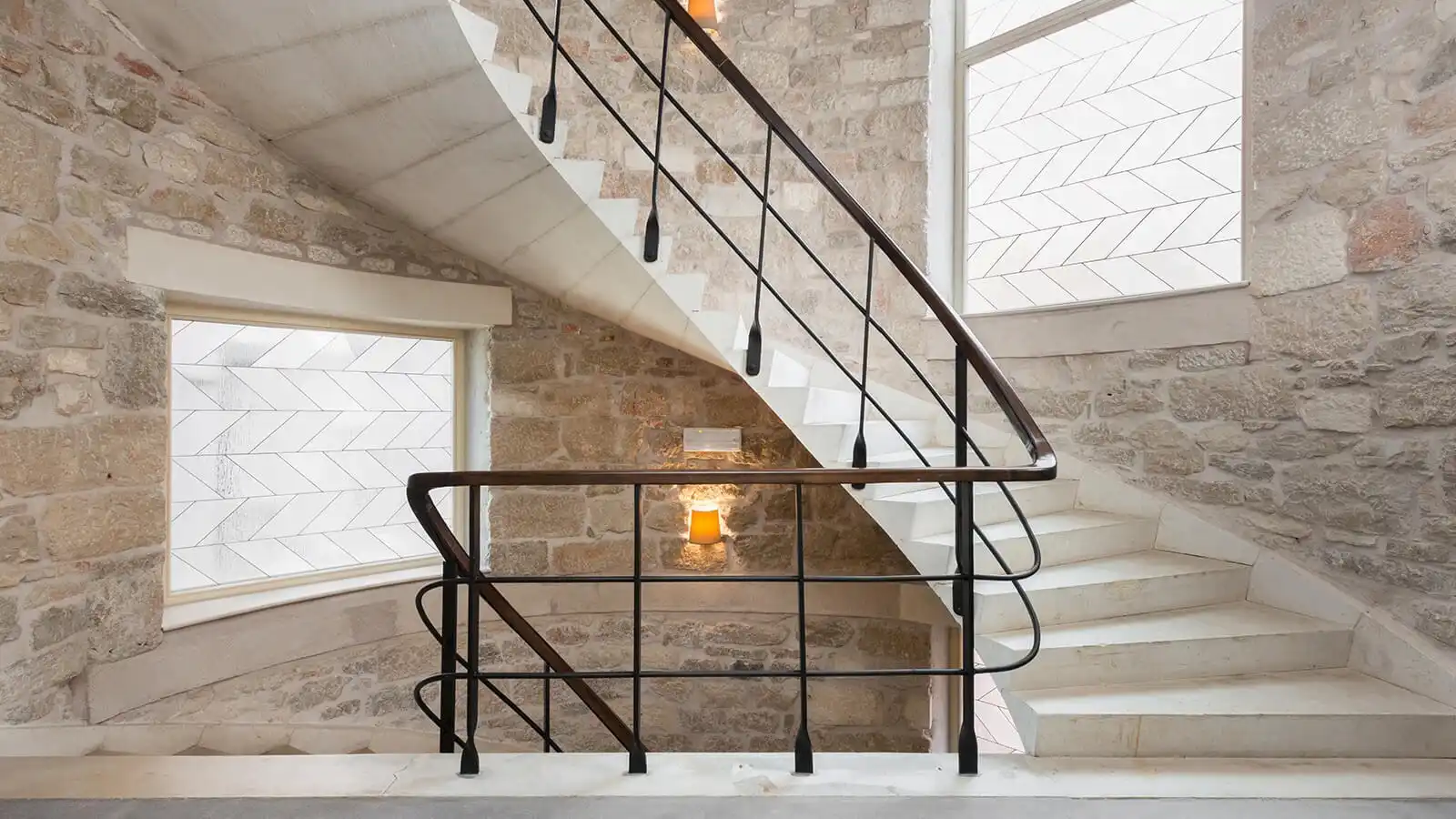 Boutique Hotel Bastion stone staircase with iron railing