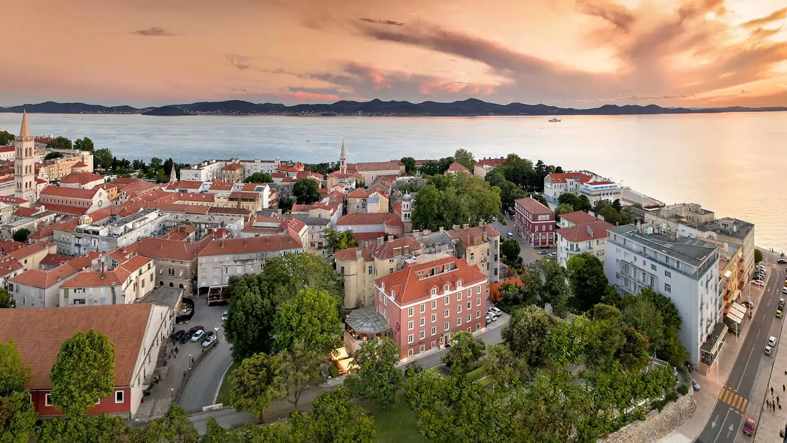 Boutique Hotel Bastion old town rooftops and sea at sunset