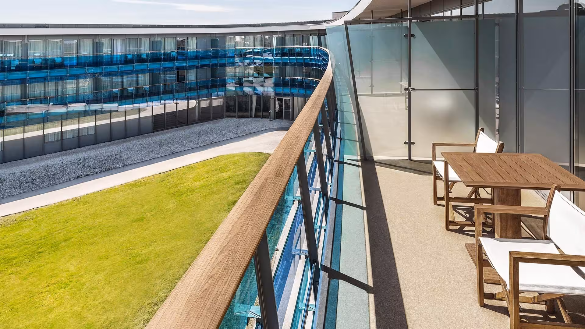 Falkensteiner Hotels Iadera/Senia Apartments balcony with wooden decking above a green lawn