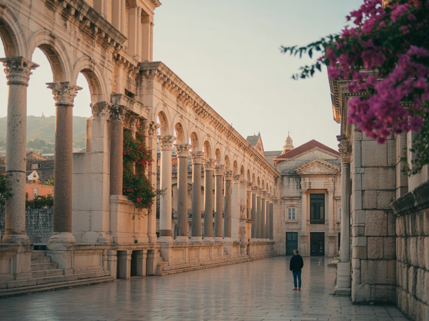 Diocletian's Palace Peristyle in Split with pink bougainvillea