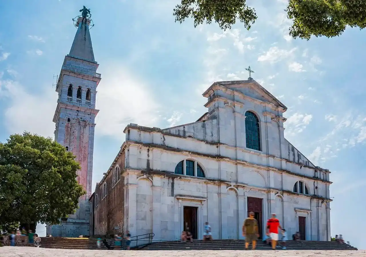 Angelo d'Oro baroque church facade and bell tower nearby