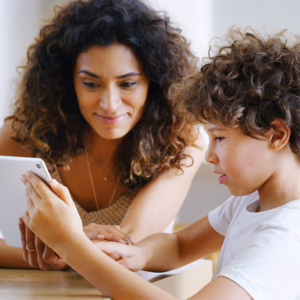 Child engaged in learning activity, guided by educational psychologist support for growth and confidence.