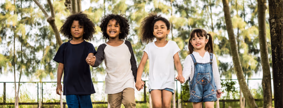 Child smiling while completing the IQ assessment 