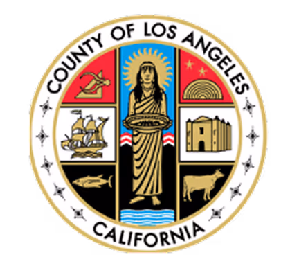Seal of Los Angeles County, California, featuring a central figure of a woman holding grapes, a sailing ship, a mission building, a cow, a fish, and a rainbow with stars.
