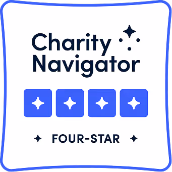 Charity Navigator four-star rating badge with four white stars on blue squares and text 'Charity Navigator' and 'Four-Star'.