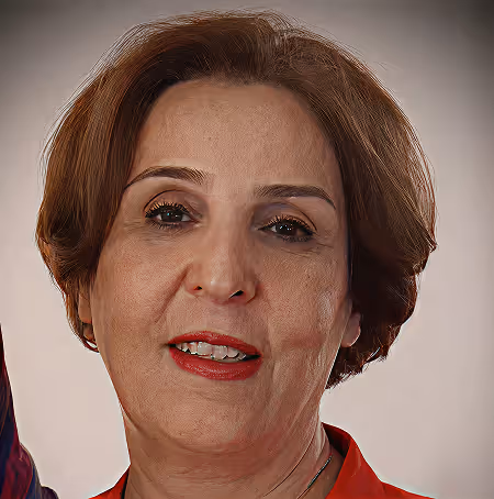Close-up of a middle-aged woman with short brown hair and red lipstick smiling softly.