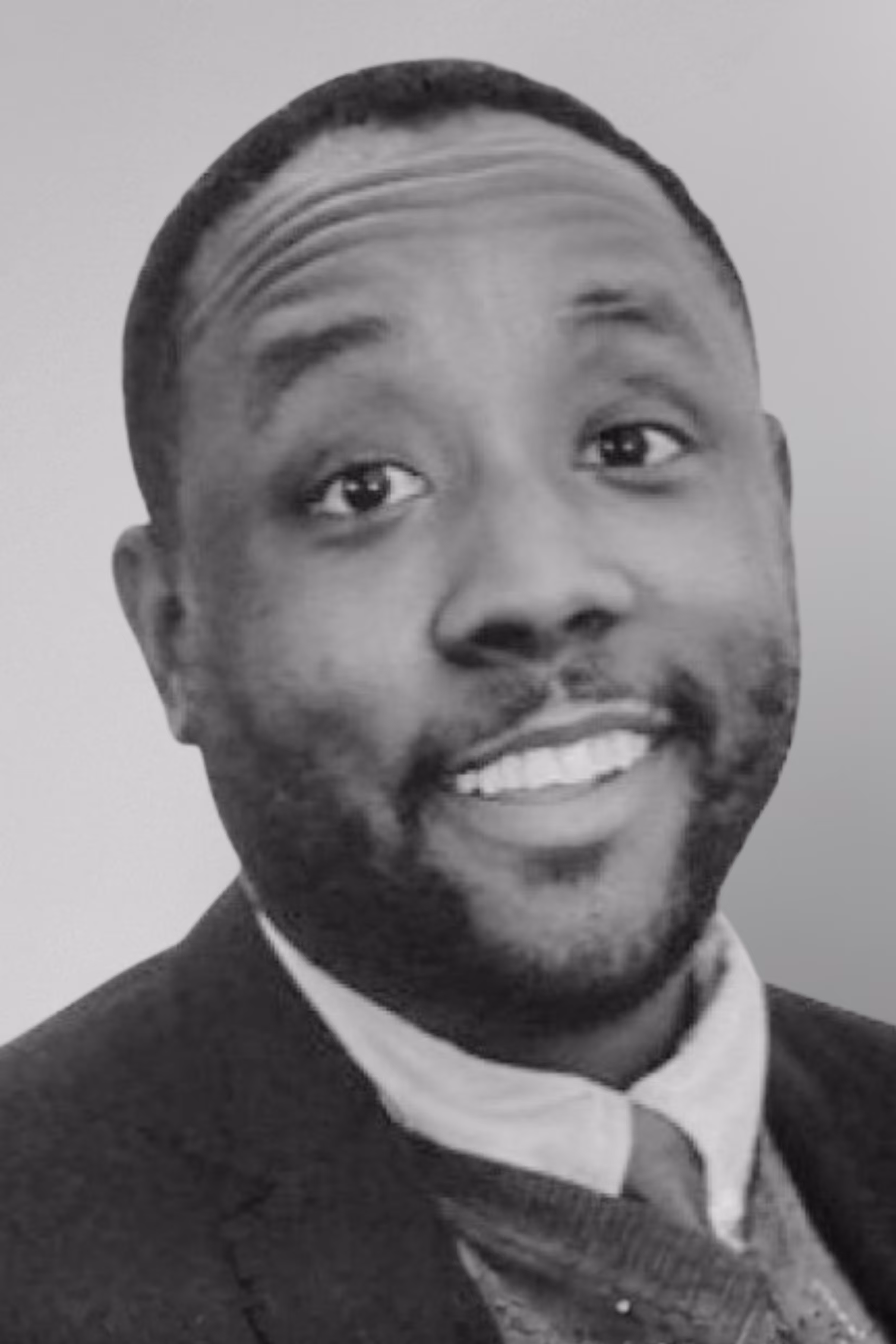 A headshot of James Caples