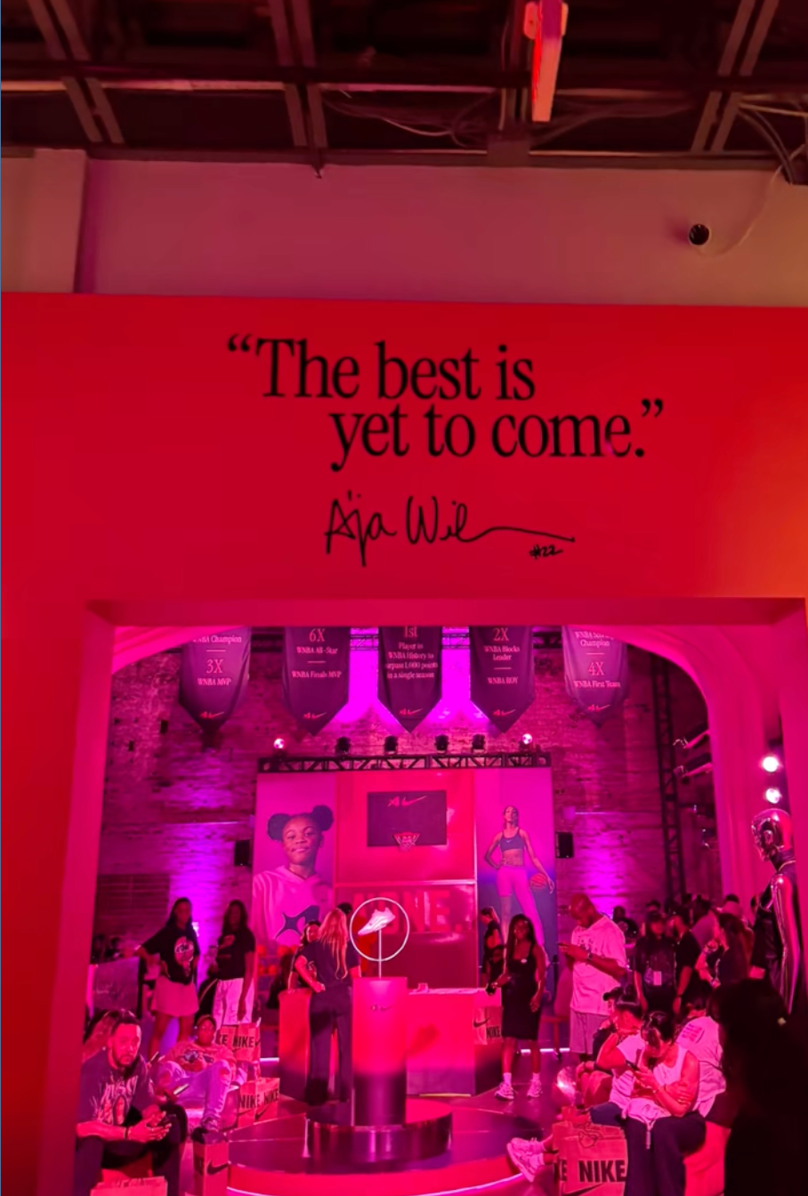 An archway overhead has a quote written on it "The best is yet to come," quoted to A'ja Wilson.