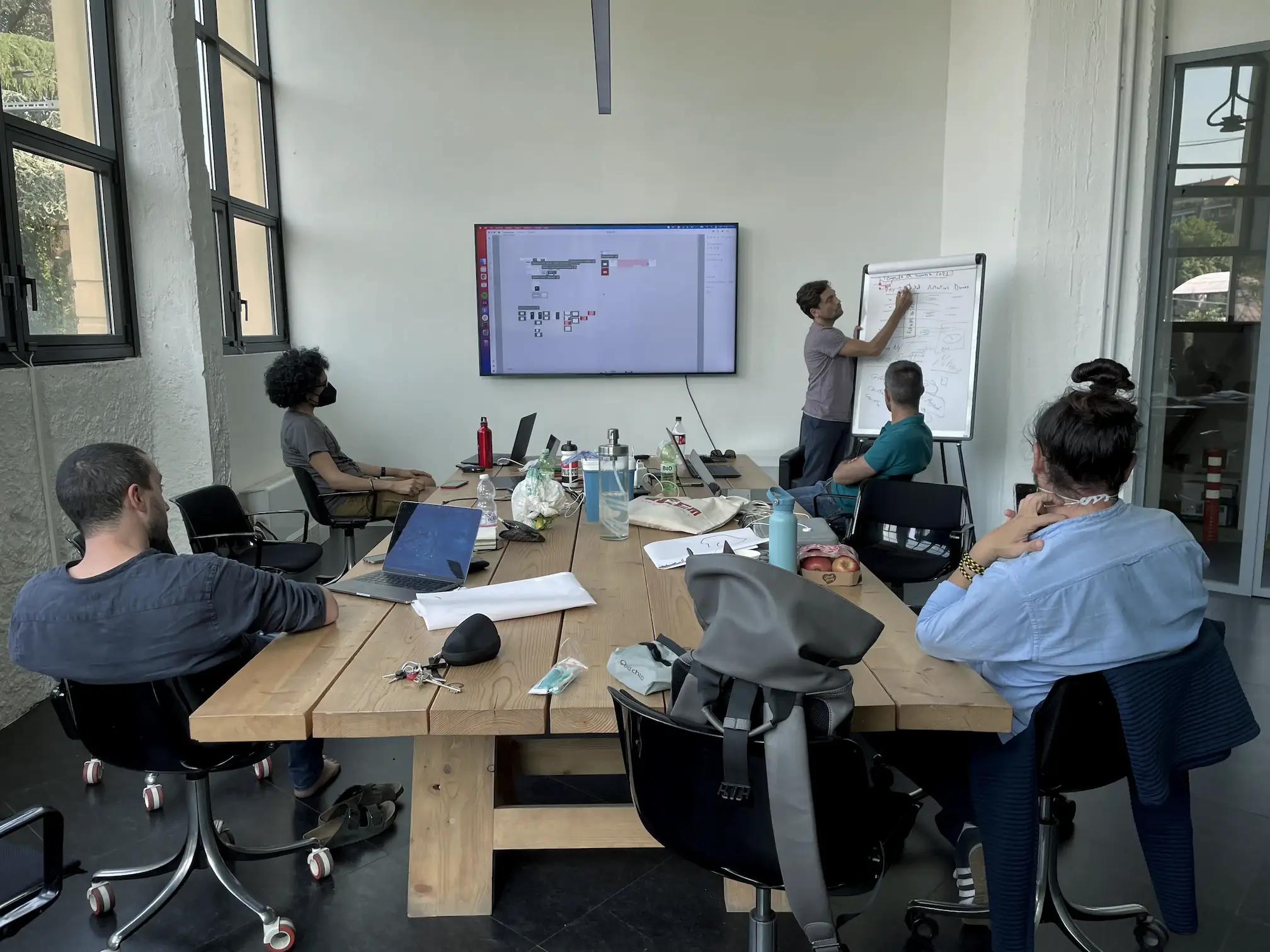 image of teacher using a smartboard (for a edtech)