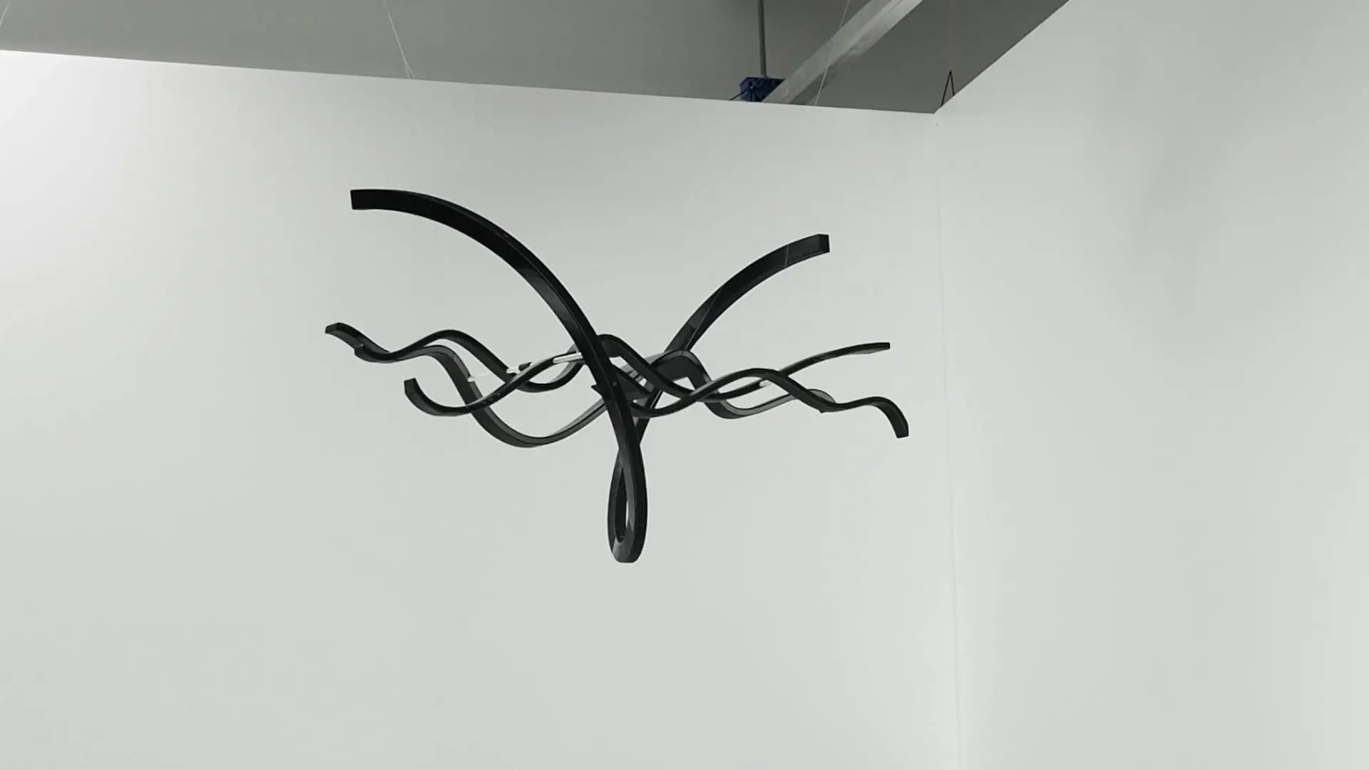 3D printed perspective sculpture of the company logo.