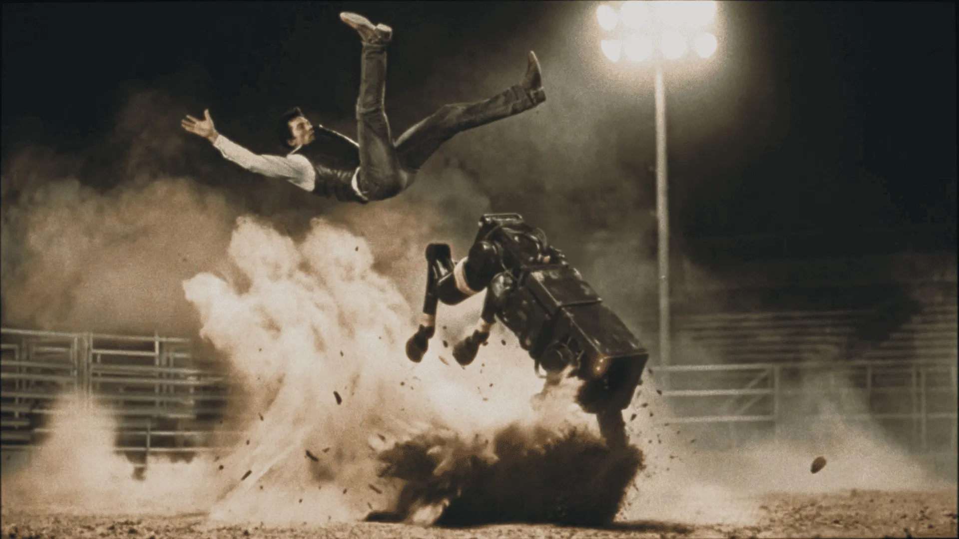 Cowboy thrown into the air above a robotic mechanical bull bucking in a dust cloud — cgi advertising by Detroit AI Production House, DOMA manifesto film