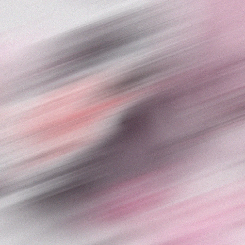 Abstract diagonal motion-blur streaks in pink and grey suggesting movement across a Dior Addict surface — ai video production Detroit, photography & art direction by Detroit AI Production House
