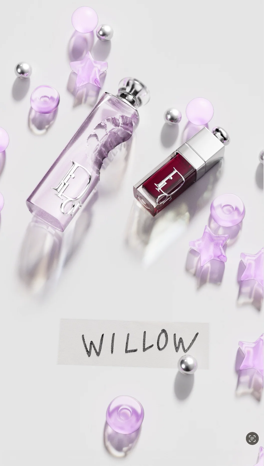 Two Dior Addict bottles in lilac tones beside a handwritten "WILLOW" label and scattered star-shaped candies — ai video production Detroit, photography & art direction by Detroit AI Production House