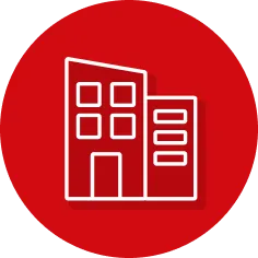 Weißes lineares Gebäudesymbol mit zwei Abschnitten auf rotem Kreis-Hintergrund.