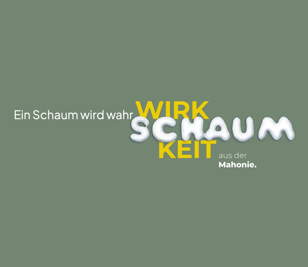 Text auf grünem Hintergrund: "Ein Schaum wird wahr", wobei "Schaum" wie Schaum dargestellt ist.