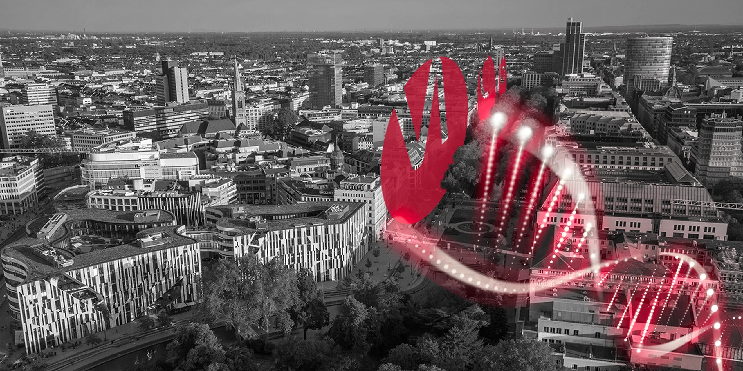 Schwarz-weiß Luftaufnahme einer Stadt mit einem hell leuchtenden roten DNA-Doppelhelix-Symbol über Gebäuden.