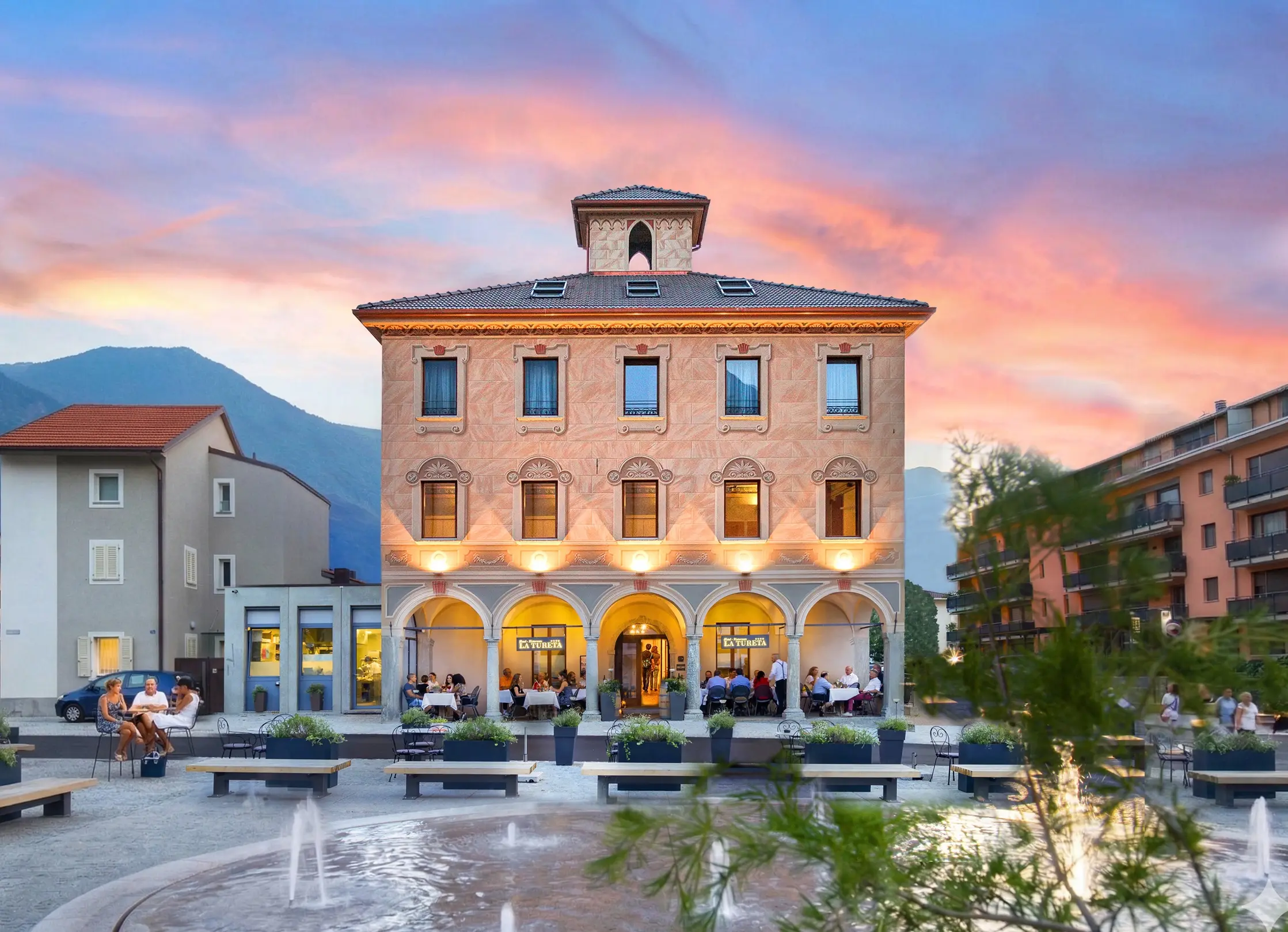 Historic facade of Hotel La Tureta - Palazzo Scalabrini in Giubiasco, Bellinzona, Ticino.