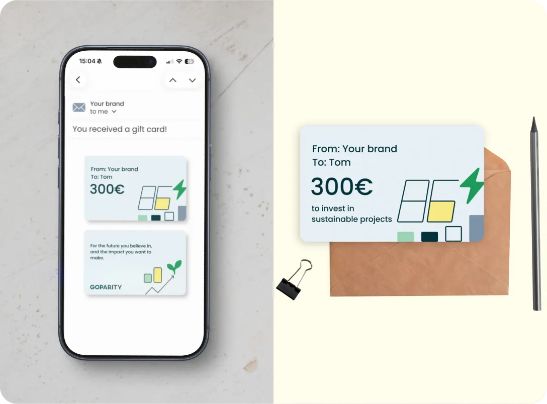 Phone showing a 300€ gift card email and a 300€ card for sustainable projects next to an envelope and pen.