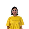 Smiling woman with short hair wearing a yellow shirt against white background.