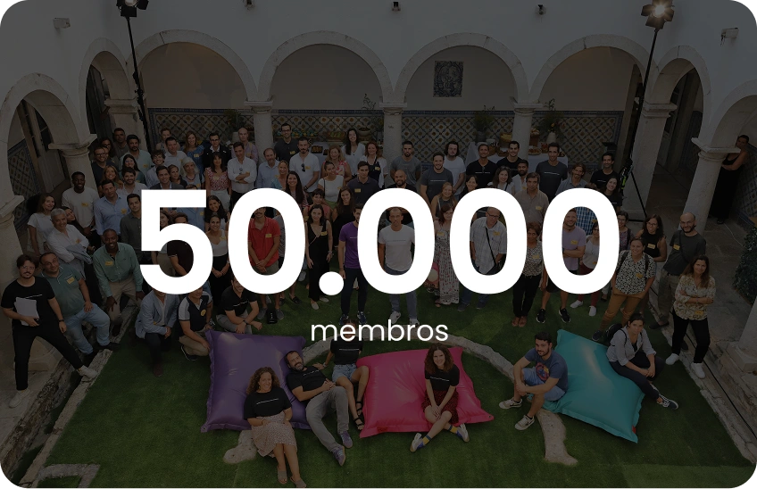 Group of diverse people gathered in a courtyard with text overlay '50,000 members'.
