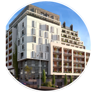 Modern multi-story residential building with balconies, greenery, and a clear blue sky.