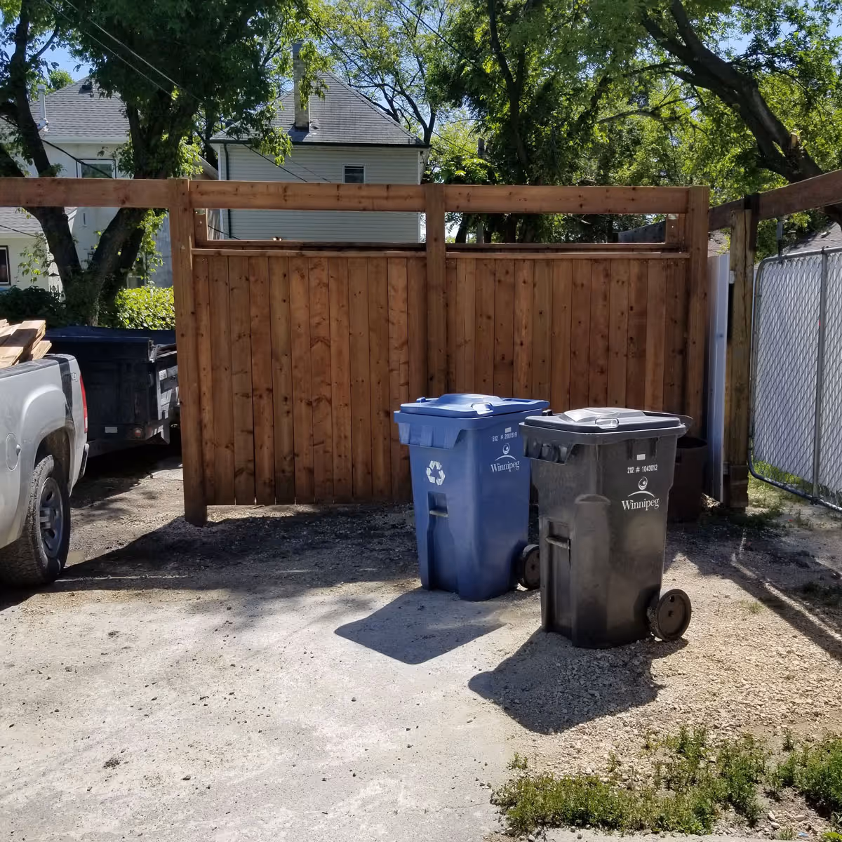 Everton Projects' signature wooden fence installation, marrying functionality with natural beauty.