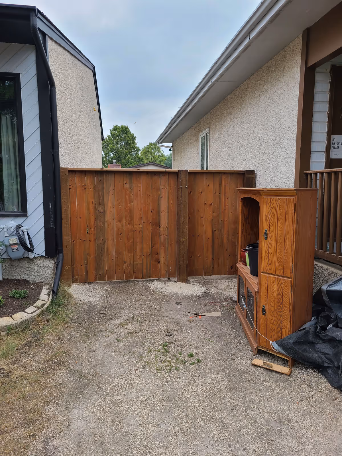 A fence that has regular maintenance of new fence posts for maximum privacy.