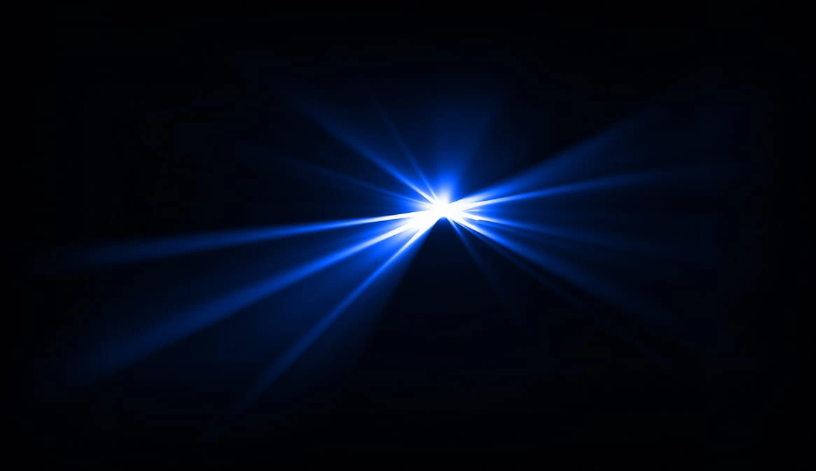 Abstract blue lens flare burst