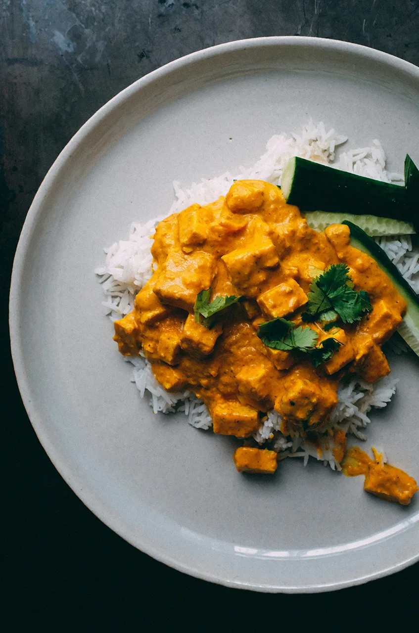 Breast chicken orange curry with basmati natural rice and cucumbers