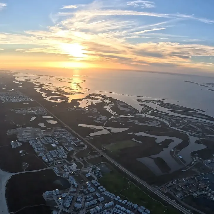 Sunset aerial view of Mustang Island from under canopy
