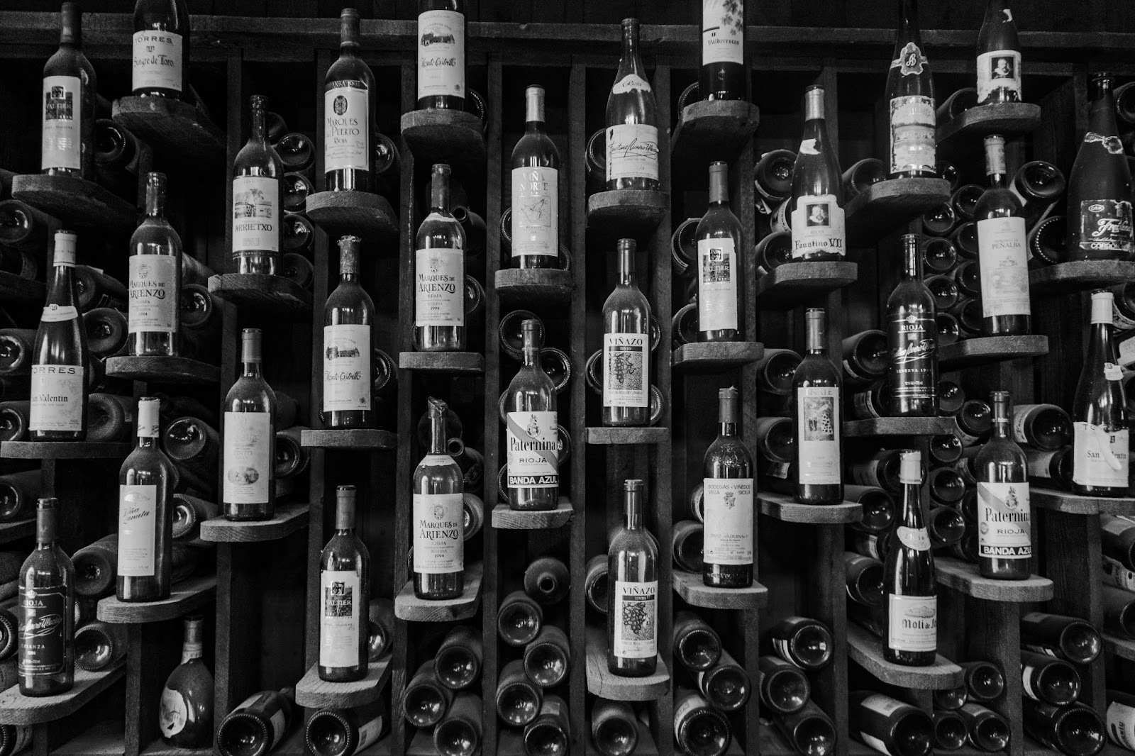 Wine bottles in display black and white