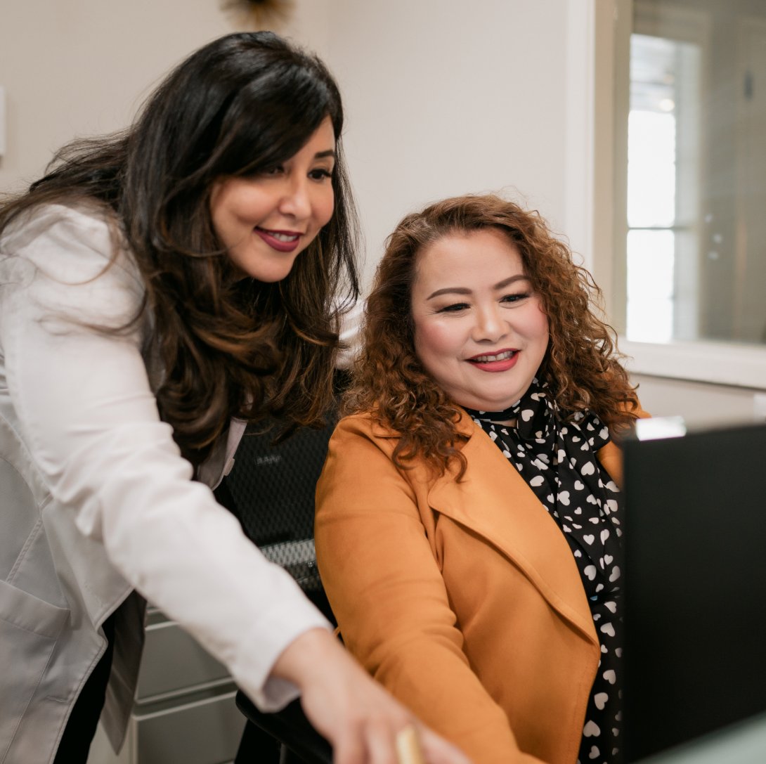 Dr. Daftarian working with her team members