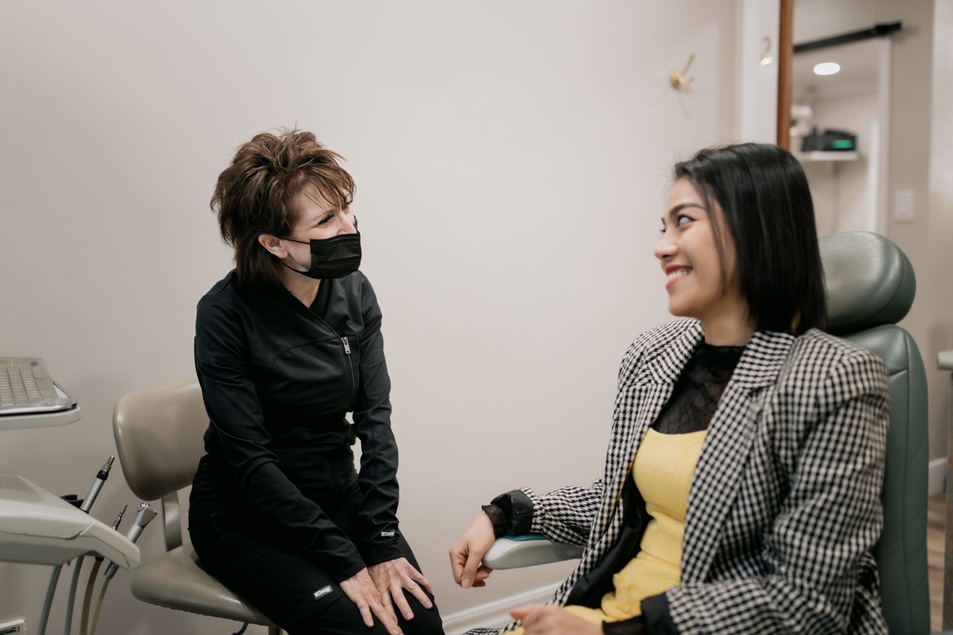 A team member smiles at a patient