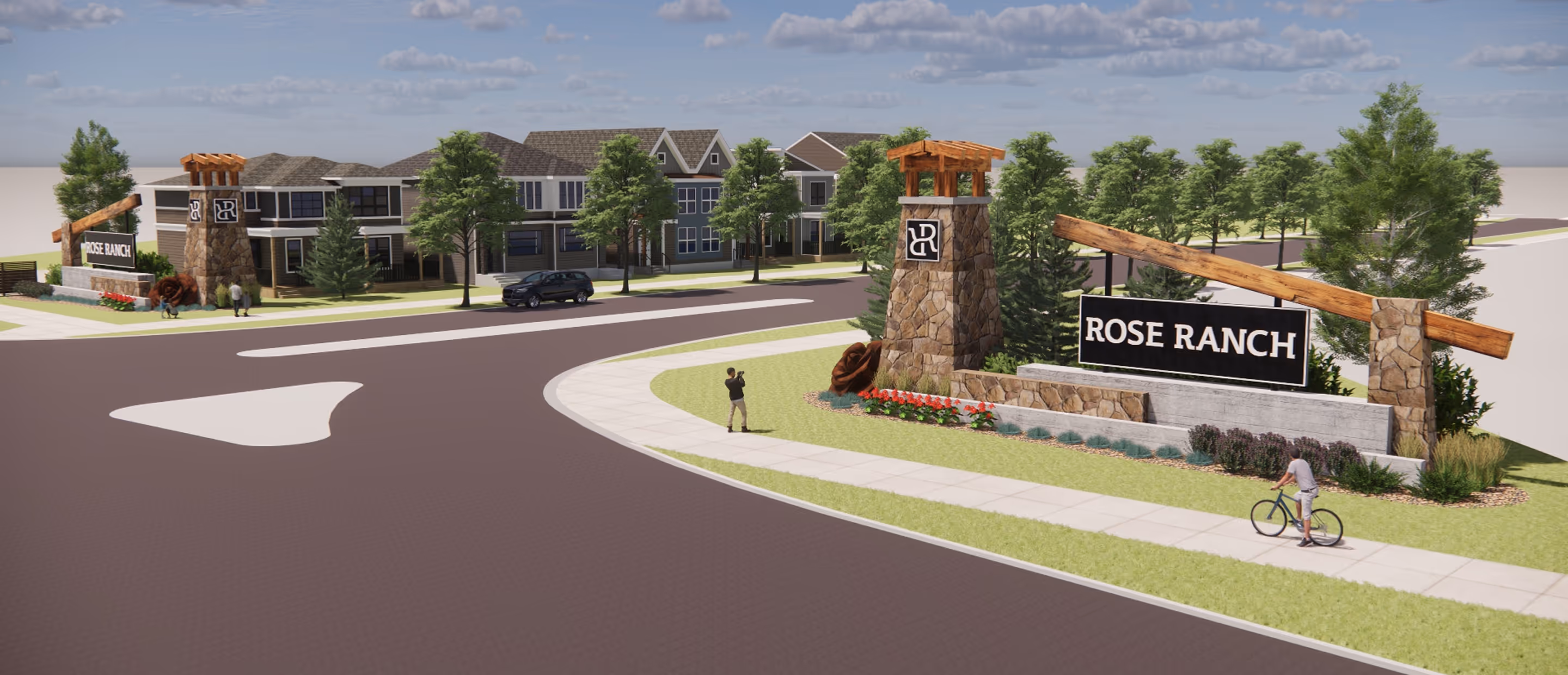 Entrance sign for Rose Ranch community with stone pillars, wooden beams, landscaping, and nearby residential buildings.