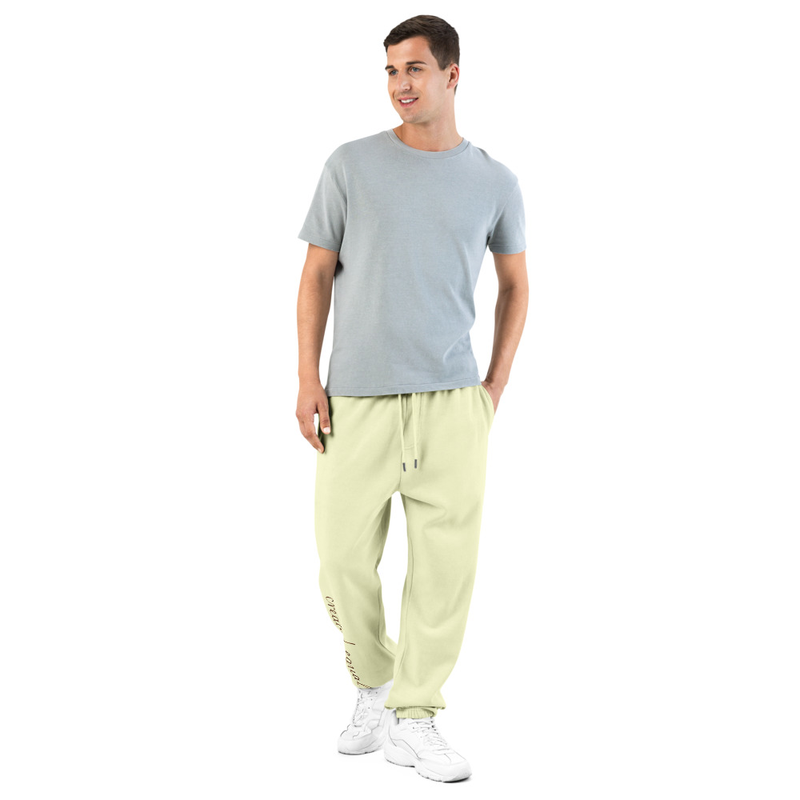 These heavyweight fleece sweatpants deliver comfort and structure with a relaxed fit. Designed for durability and daily wear, they feature secure zipped pockets and a smooth finish that elevates any casual look.

• 80% cotton, 20% recycled polyester
• Heavyweight fabric: 10 oz./yd² (340 g/m²)
• Relaxed fit with elastic waistband and cuffs
• Zipped side pockets for added security
• Metal-tipped drawcords
• Blank product sourced from Pakistan