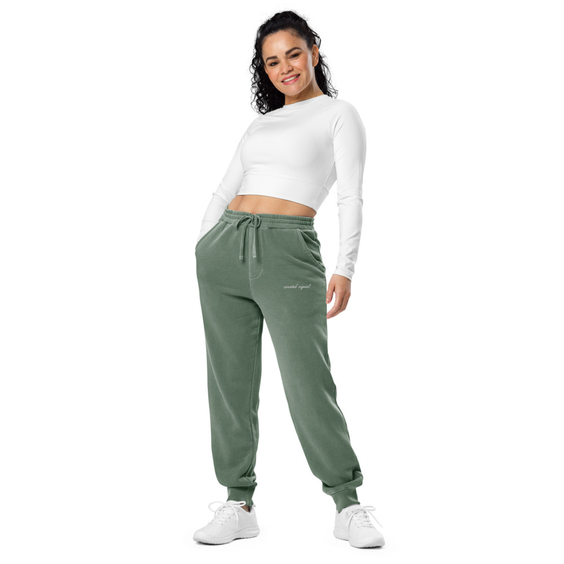 Get the effortless celebrity off-duty look with the unisex pigment-dyed sweatpants. The garment dyeing process makes the sweatpants look washed out and ensures a unique shade for each pair. The sweatpants have two pockets on the front and one on the back, and adjustable drawstrings for a secure fit around the waist.

• 80% ring-spun cotton and 20% polyester
• 100% cotton face
• Yarn diameter: 30 singles
• Fabric weight: 9 oz./yd² (305.15 g/m²)
• Relaxed fit
• Sewn eyelets and fly detail
• Elastic waistband 
• Flat, color-matching drawstrings
• 1x1 rib at ankle cuffs
• Jersey-lined slash pockets
• Back pocket
• Woven label
• Blank product sourced from China