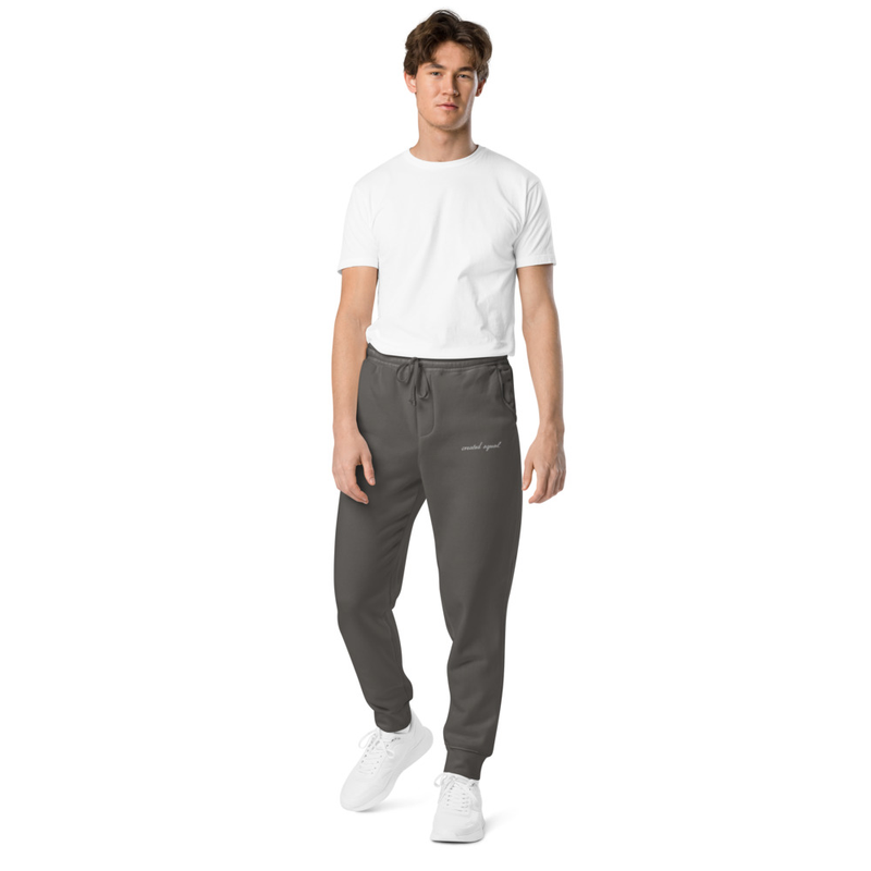 Get the effortless celebrity off-duty look with the unisex pigment-dyed sweatpants. The garment dyeing process makes the sweatpants look washed out and ensures a unique shade for each pair. The sweatpants have two pockets on the front and one on the back, and adjustable drawstrings for a secure fit around the waist.

• 80% ring-spun cotton and 20% polyester
• 100% cotton face
• Yarn diameter: 30 singles
• Fabric weight: 9 oz./yd² (305.15 g/m²)
• Relaxed fit
• Sewn eyelets and fly detail
• Elastic waistband 
• Flat, color-matching drawstrings
• 1x1 rib at ankle cuffs
• Jersey-lined slash pockets
• Back pocket
• Woven label
• Blank product sourced from China