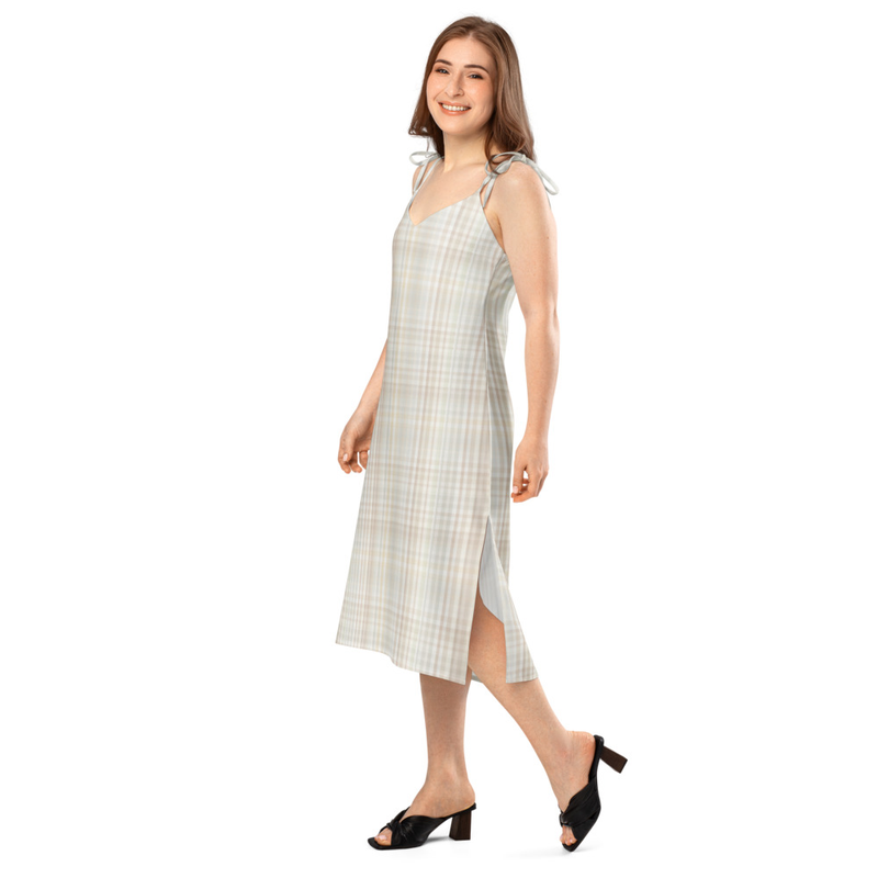 Floaty, flirty, and totally flattering—from daytime garden parties to dinner dates. This midi dress features a breezy side slit, adjustable tie straps, and a built-in bra for no-fuss style.

• 100% heavy polyester chiffon
• Fabric weight: 5.9 oz./yd.² (200 g/m²)
• Midi length with front side slit
• V-neckline
• Adjustable tie-close shoulder straps
• Built-in bra
• Relaxed fit
• Blank product sourced from China