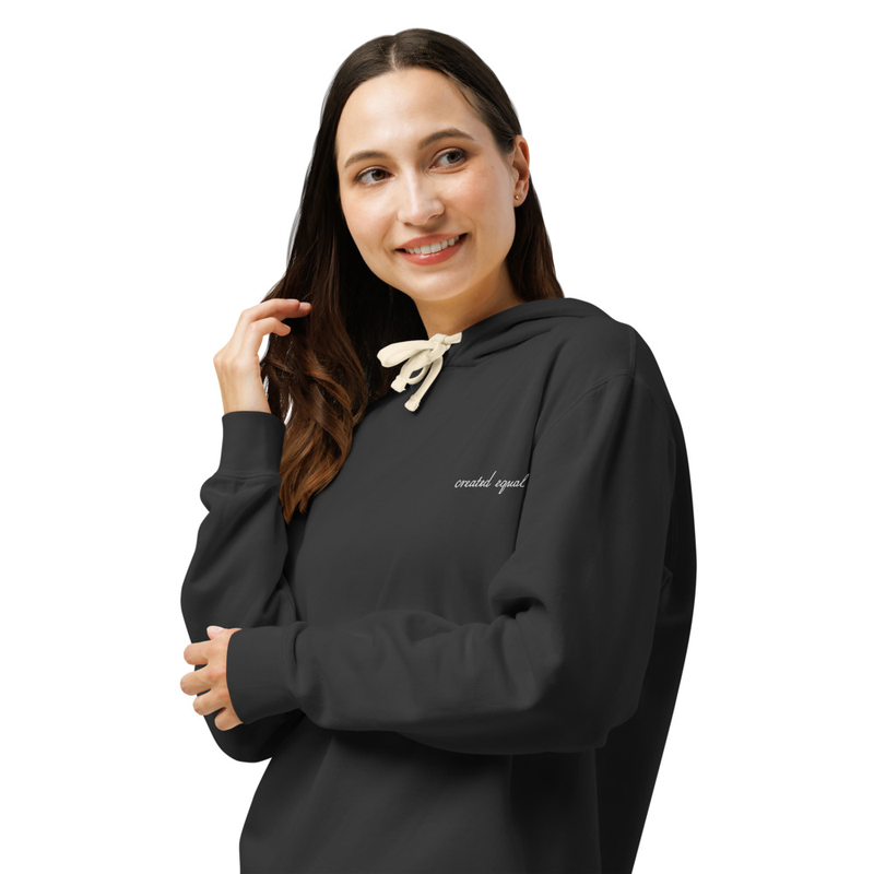 Add a touch of vintage comfort to your everyday rotation with this soft, relaxed hoodie. Made from 100% ring-spun cotton, it offers a worn-in feel and lived-in color thanks to its garment-dyed finish. Perfect for layering or lounging, this sweatshirt blends casual comfort with timeless style.

• 100% ring-spun cotton
• Lightweight fabric: 6.4 oz./yd.² (217 g/m²)
• Relaxed fit
• Seamless-body
• Natural-colored flat drawcord (white drawcord on White color)
• Ribbed cuffs and waistband
• The fabric of this product is OEKO-TEX Standard 100 certified
• Blank product sourced from El Salvador