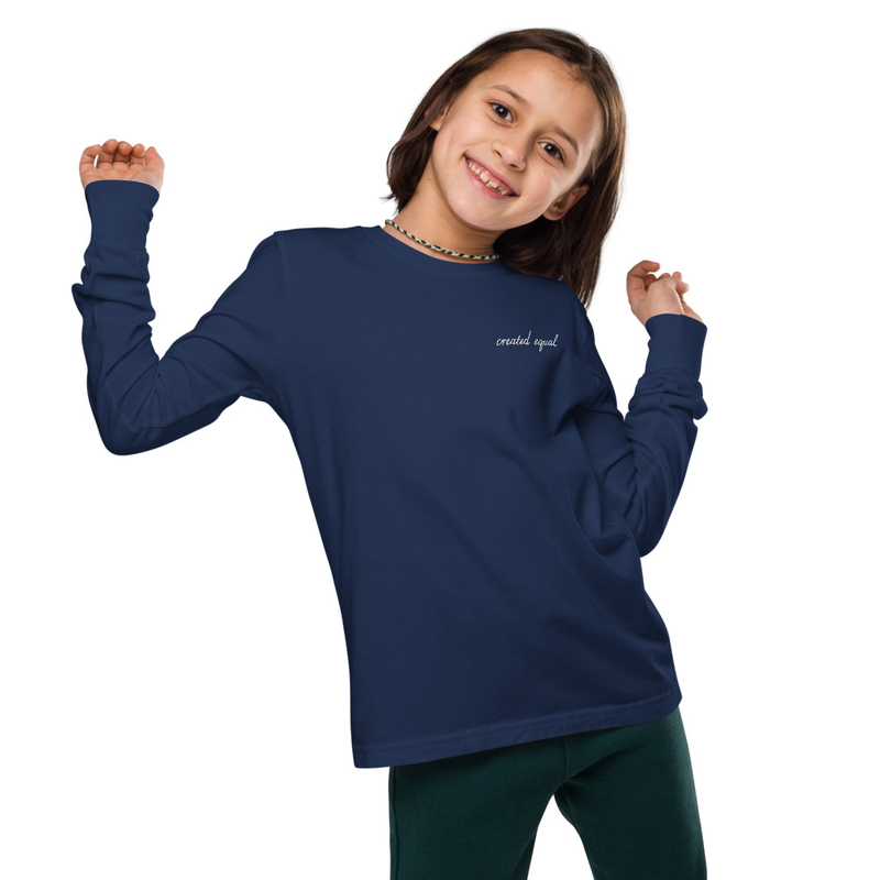 The Youth Long Sleeve Shirt is made of Airlume combed and ringspun cotton, which is known for its softness and durability. The shirt has a regular fit, classic crew neck, and ribbed cuff.

• 100% Airlume combed and ring-spun cotton
• Athletic Heather is 90% Airlume combed and ring-spun cotton, 10% polyester
• Fabric weight: 4.2 oz/yd² (180 g/m²)
• Regular fit
• Side-seamed construction
• Ribbed cuff
• Blank product sourced from Honduras, Nicaragua, US
