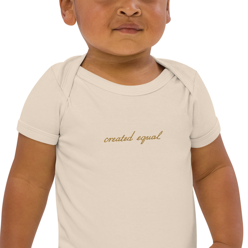 Made from 100% certified organic cotton, this comfy bodysuit will be the right step towards a more sustainable lifestyle. With its extra soft and stretchy fabric and envelope neckline, it’ll be the perfect choice for all active babies.

• 100% certified organic cotton
• Soft and stretchy fabric
• 3 self-colored nickel-free poppers at the crotch
• Envelope neckline
• Fabric weight: 5.9 oz/yd² (200 g/m²)
• Binding at neck, arms, and legs for shape retention